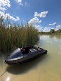 Wave-Vo electric mini jet boat on the water at a Divine Voltage test ride in New Braunfels, Texas